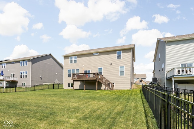 3969 Canning St, Danville, IN 46122 - back of property with a fenced backyard, a deck, and stairs