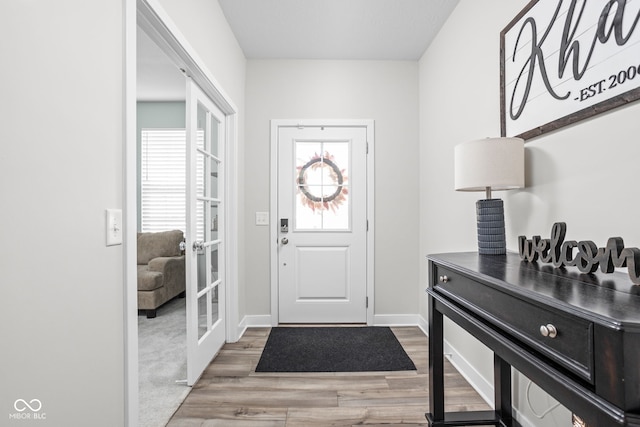 3969 Canning St, Danville, IN 46122 - foyer with wood finished floors and french doors