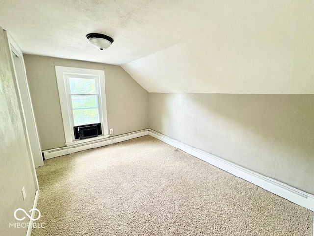 1076 N Old Highway 27, Winchester, IN 47394 - additional living space featuring carpet flooring, lofted ceiling, baseboard heating, and cooling unit