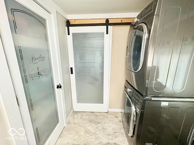 1076 N Old Highway 27, Winchester, IN 47394 - laundry room with stacked washer and clothes dryer and baseboards
