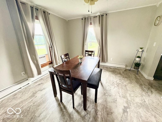 1076 N Old Highway 27, Winchester, IN 47394 - dining area with baseboard heating, ornamental molding, and ceiling fan
