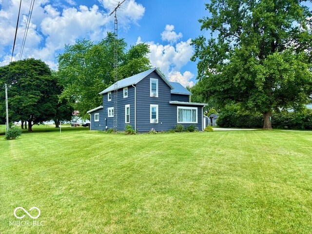 1076 N Old Highway 27, Winchester, IN 47394 - view of property exterior with a lawn