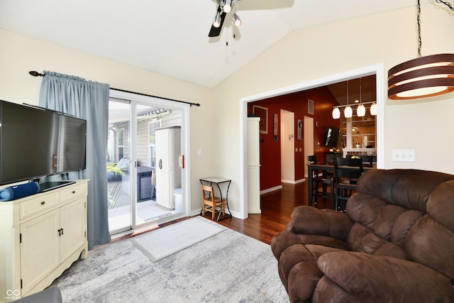 9022 Hosta Way, Camby, IN 46113 - living area featuring lofted ceiling, wood finished floors, and a ceiling fan