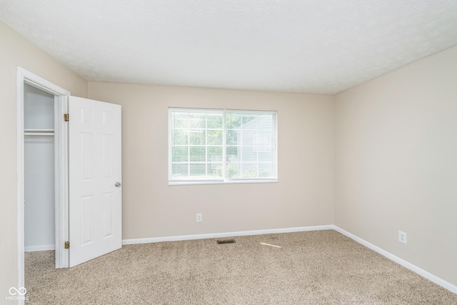 3515 Bearwood Ct, Indianapolis, IN 46235 - unfurnished bedroom featuring carpet and a closet