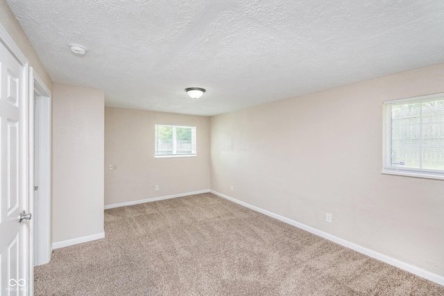 3515 Bearwood Ct, Indianapolis, IN 46235 - unfurnished bedroom with light carpet and a textured ceiling