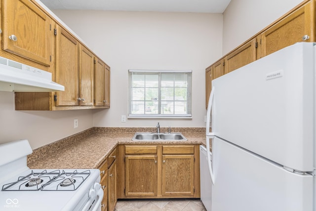 3515 Bearwood Ct, Indianapolis, IN 46235 - kitchen with white appliances, under cabinet range hood, brown cabinetry, and light tile patterned flooring