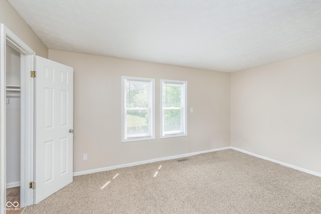 3515 Bearwood Ct, Indianapolis, IN 46235 - unfurnished bedroom featuring carpet flooring and baseboards