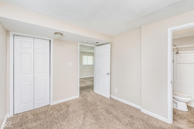 3515 Bearwood Ct, Indianapolis, IN 46235 - unfurnished bedroom featuring a closet and carpet floors