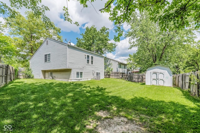 3515 Bearwood Ct, Indianapolis, IN 46235 - rear view of property with a storage unit and a fenced backyard