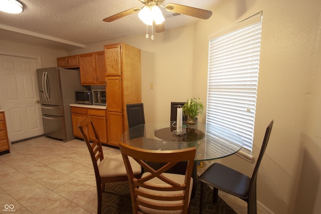291 Lakemoore St, Brownsburg, IN 46112 - dining area with a ceiling fan and a textured ceiling
