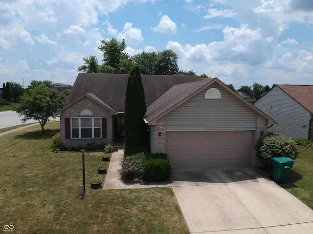 291 Lakemoore St, Brownsburg, IN 46112 - ranch-style house featuring brick siding, an attached garage, concrete driveway, and a front yard
