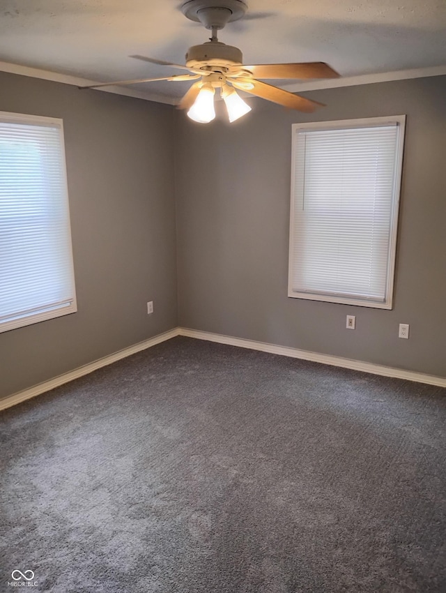 94 N Routiers Ave, Indianapolis, IN 46219 - empty room featuring a ceiling fan and dark colored carpet