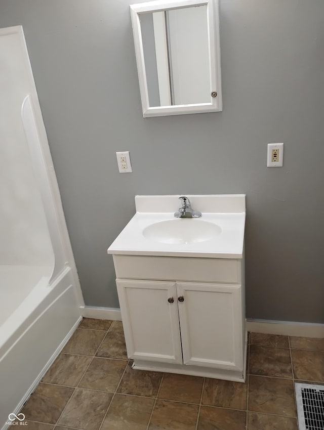 94 N Routiers Ave, Indianapolis, IN 46219 - bathroom with baseboards and vanity