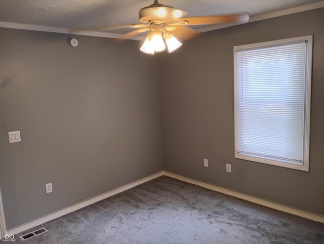 94 N Routiers Ave, Indianapolis, IN 46219 - empty room with ceiling fan, dark carpet, and a smoke detector