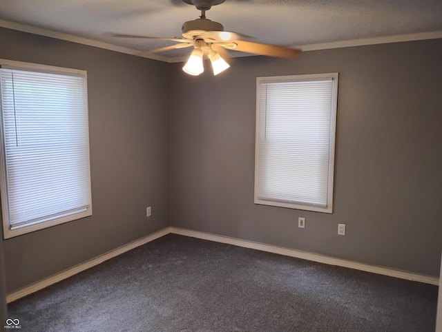 94 N Routiers Ave, Indianapolis, IN 46219 - empty room with a ceiling fan, dark colored carpet, and ornamental molding
