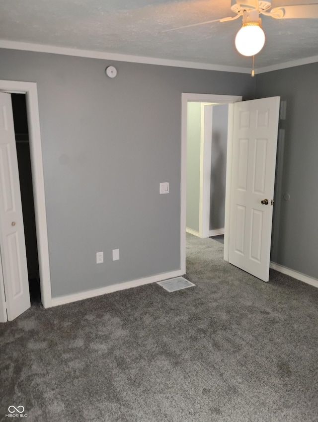 94 N Routiers Ave, Indianapolis, IN 46219 - unfurnished bedroom featuring carpet floors and ornamental molding