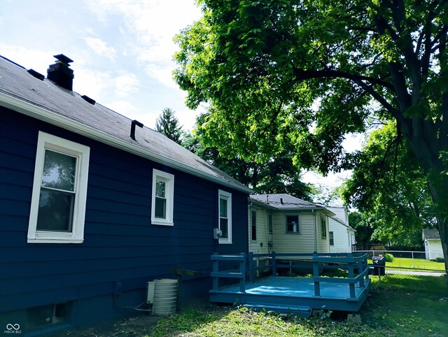 94 N Routiers Ave, Indianapolis, IN 46219 - view of side of property featuring a wooden deck