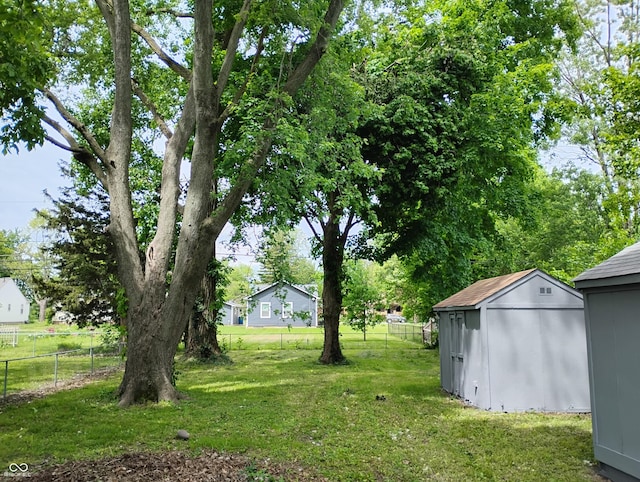 94 N Routiers Ave, Indianapolis, IN 46219 - view of yard with a storage shed