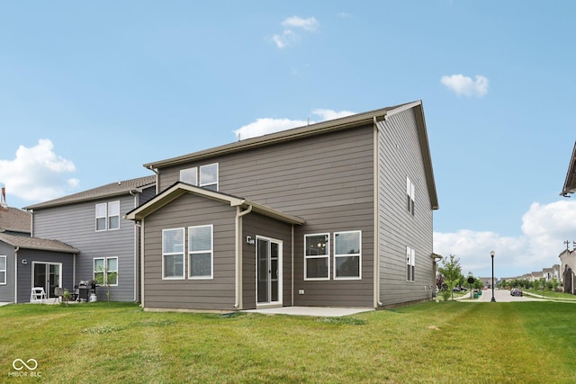 1911 Goodwin Pl, Westfield, IN 46074 - rear view of house featuring a lawn and a patio area
