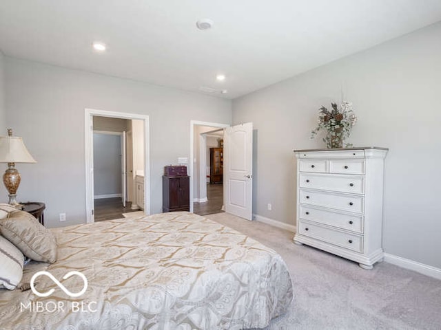 8866 Twain Ln, Indianapolis, IN 46239 - bedroom with light colored carpet and recessed lighting