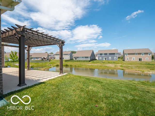 8866 Twain Ln, Indianapolis, IN 46239 - view of green lawn featuring a pergola, a patio area, a residential view, and a water view