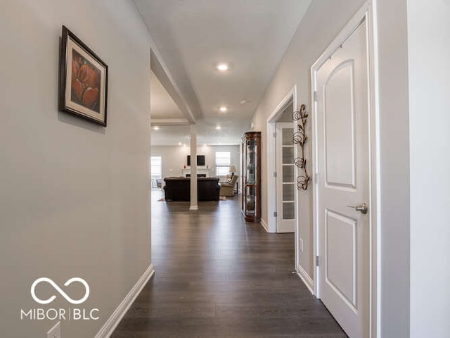 8866 Twain Ln, Indianapolis, IN 46239 - hallway with dark wood-style flooring and recessed lighting