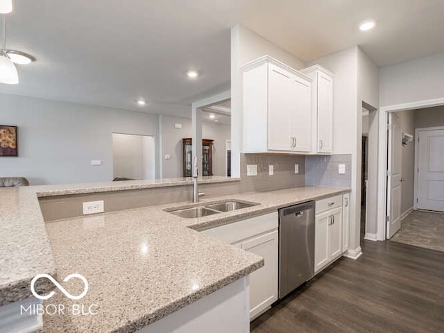 8866 Twain Ln, Indianapolis, IN 46239 - kitchen featuring dishwasher, white cabinetry, light stone countertops, dark wood-type flooring, and recessed lighting
