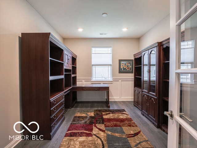 8866 Twain Ln, Indianapolis, IN 46239 - office area with dark wood finished floors, wainscoting, a decorative wall, and recessed lighting