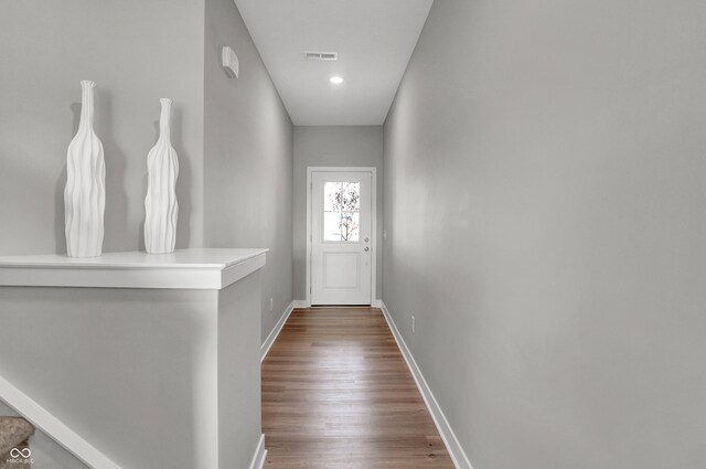 7681 Marin Pkwy, Cumberland, IN 46229 - doorway to outside with wood finished floors and recessed lighting