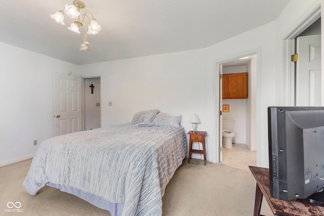 1016 W Creek Ridge Dr, Fountaintown, IN 46130 - carpeted bedroom with a chandelier and baseboards