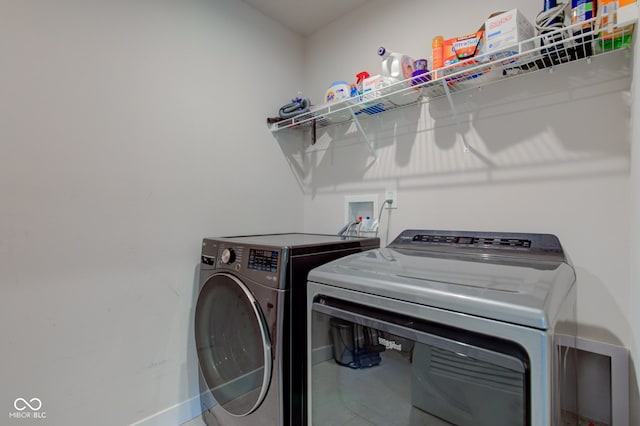 2500 Sand Hollow Dr, Lebanon, IN 46052 - laundry area featuring baseboards and separate washer and dryer