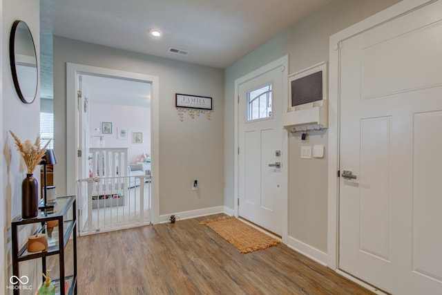 2500 Sand Hollow Dr, Lebanon, IN 46052 - foyer featuring wood finished floors and baseboards