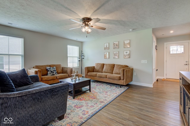 2500 Sand Hollow Dr, Lebanon, IN 46052 - living area with a textured ceiling, light wood-style floors, ceiling fan, and recessed lighting