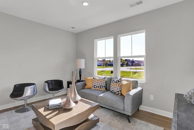 7693 Marin Pkwy, Cumberland, IN 46229 - living area featuring baseboards and wood finished floors