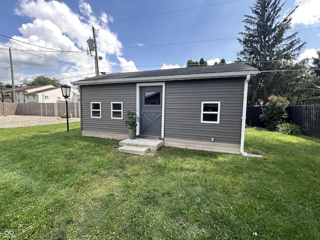 2845 12th St, Columbus, IN 47201 - rear view of property featuring a fenced backyard and an outdoor structure
