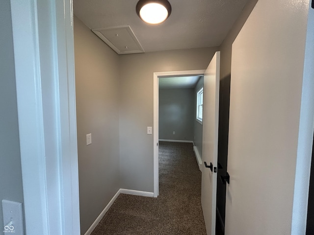 2845 12th St, Columbus, IN 47201 - hall with dark carpet and attic access