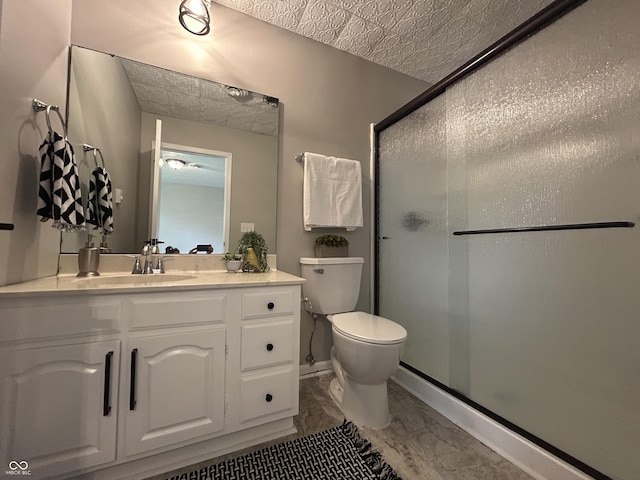 2845 12th St, Columbus, IN 47201 - full bath featuring marble finish flooring, a shower stall, vanity, and a textured ceiling
