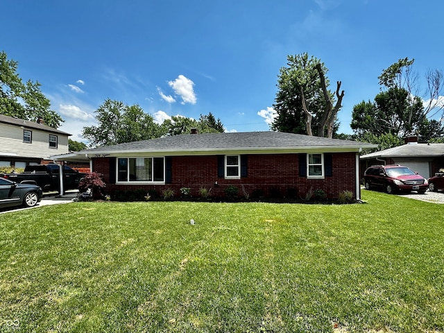 5015 Nowland Ave, Indianapolis, IN 46201 - ranch-style house featuring brick siding and a front lawn