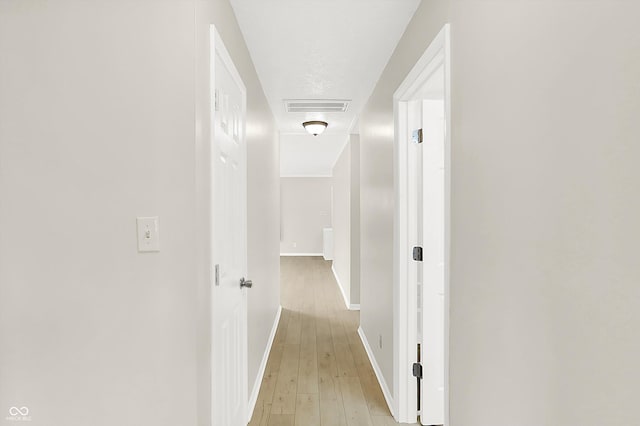 5015 Nowland Ave, Indianapolis, IN 46201 - corridor with light wood-style floors and baseboards