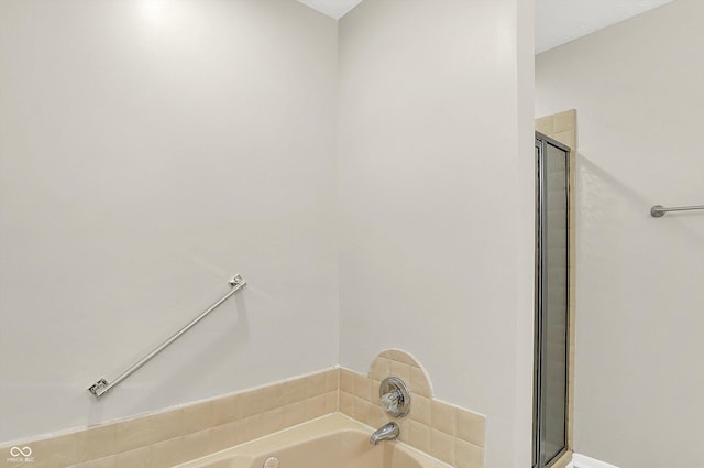 5015 Nowland Ave, Indianapolis, IN 46201 - full bathroom featuring a bath and a shower with shower door