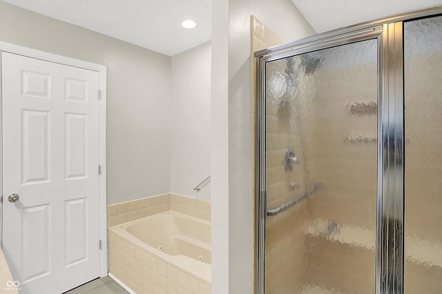 5015 Nowland Ave, Indianapolis, IN 46201 - full bath featuring a whirlpool tub, a shower stall, and recessed lighting