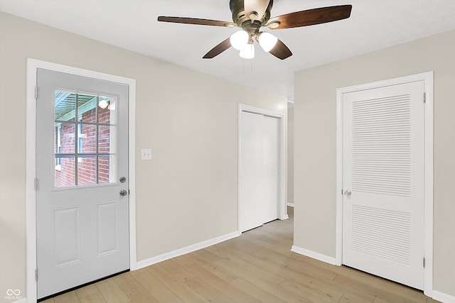 5015 Nowland Ave, Indianapolis, IN 46201 - entrance foyer with light wood-style floors and ceiling fan