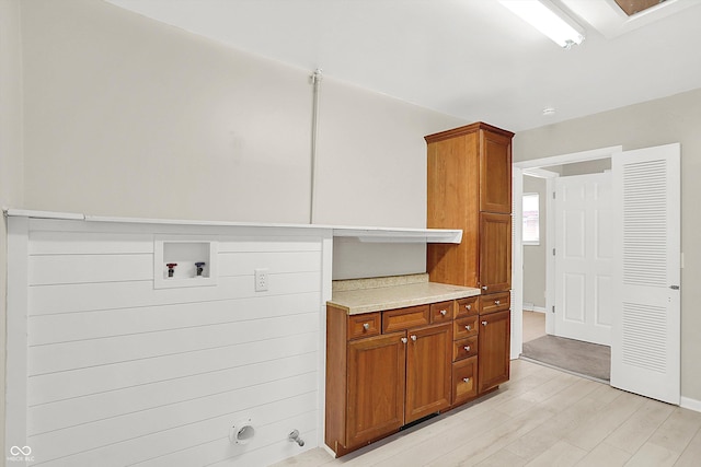 5015 Nowland Ave, Indianapolis, IN 46201 - washroom with hookup for a washing machine and light wood-style floors