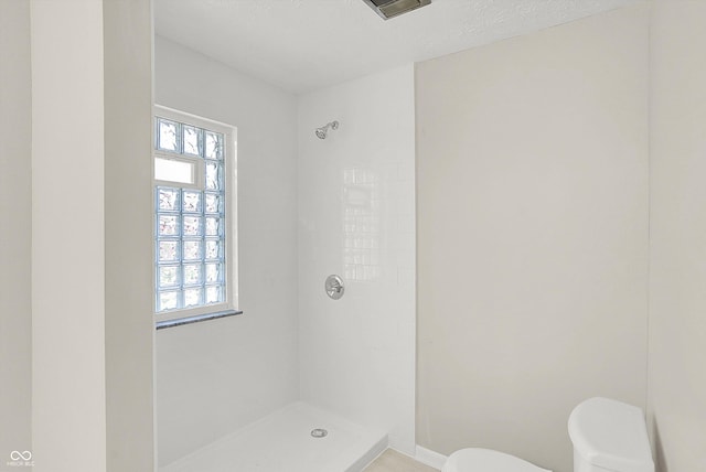 5015 Nowland Ave, Indianapolis, IN 46201 - full bathroom with a tile shower and plenty of natural light