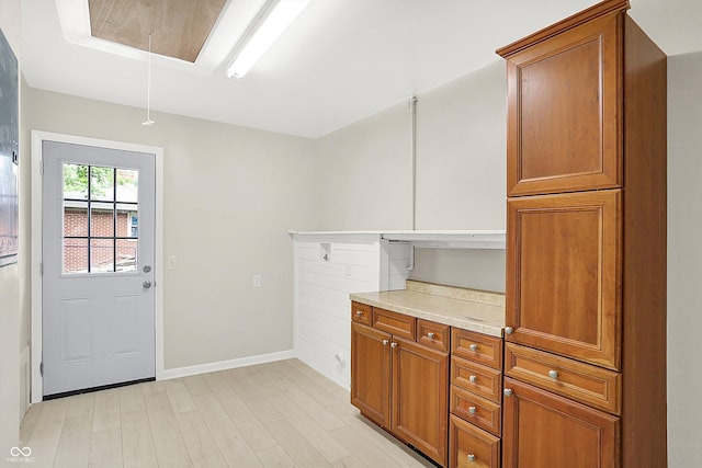 5015 Nowland Ave, Indianapolis, IN 46201 - laundry area featuring attic access and light wood finished floors