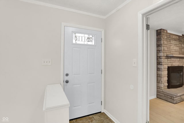 5015 Nowland Ave, Indianapolis, IN 46201 - foyer with ornamental molding and a stone fireplace