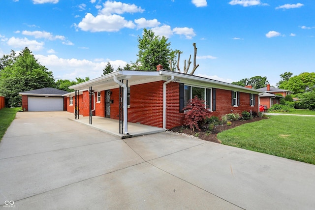 5015 Nowland Ave, Indianapolis, IN 46201 - single story home with a front yard, an outbuilding, brick siding, a garage, and a chimney