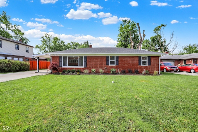5015 Nowland Ave, Indianapolis, IN 46201 - ranch-style house featuring brick siding, a chimney, and driveway
