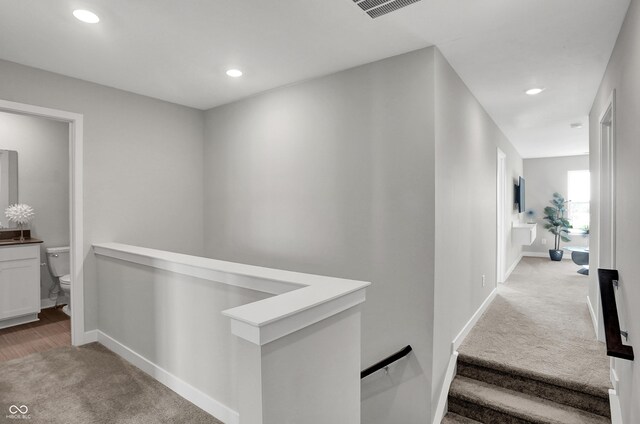 7687 Marin Pkwy, Cumberland, IN 46229 - corridor featuring carpet, an upstairs landing, and recessed lighting