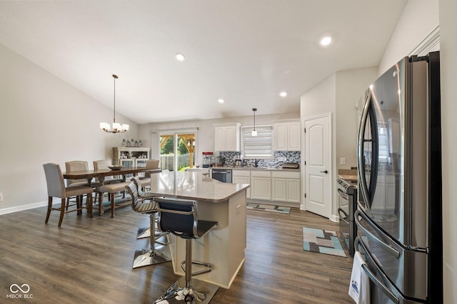 153 Patriots Lndg, Fillmore, IN 46128 - kitchen with stainless steel appliances, dark wood-type flooring, white cabinetry, decorative backsplash, and pendant lighting